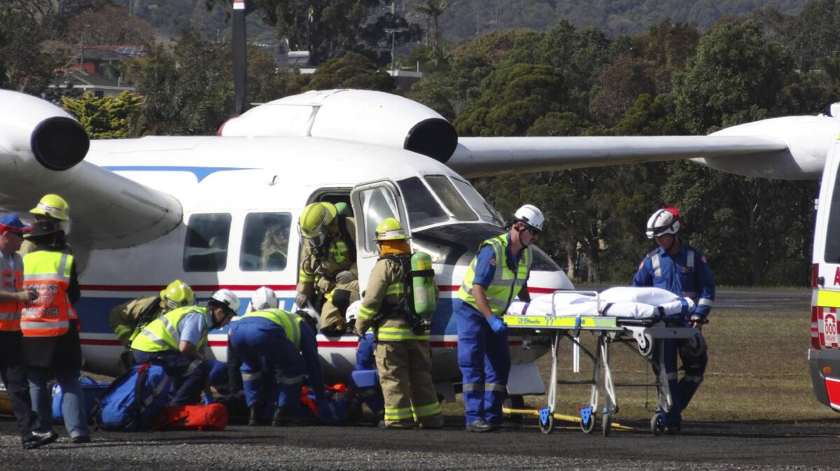 Emergency personnel during a drill at Albion Park airport that tested inter-agency co-ordination.