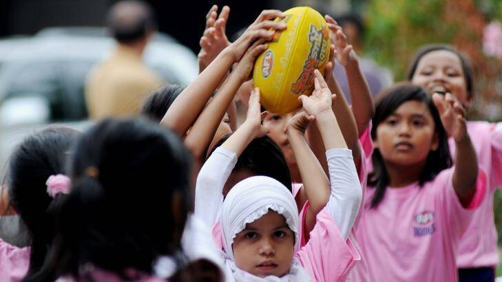 For the past 10 years AFL Indonesia has been running free football clinics in schools and orphanages in Jakarta, Bogor, Bandung and Cileungsi. Photo: Jefri Tarigan