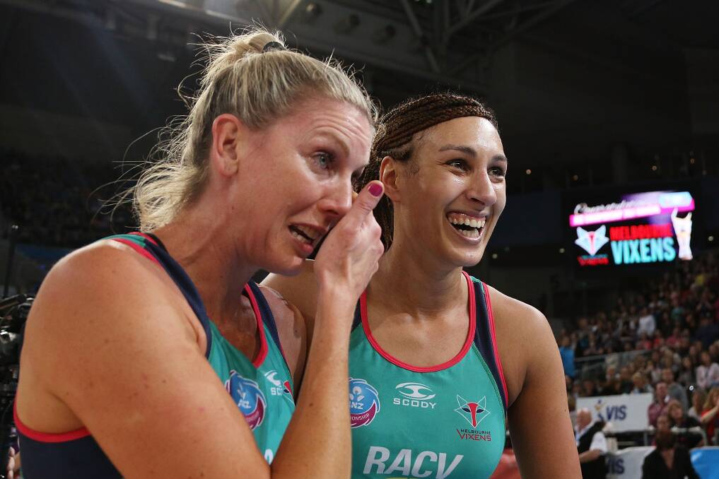 A tearful Catherine Cox and Geva Mentor embrace after Vixens victory. Picture: GETTY IMAGES