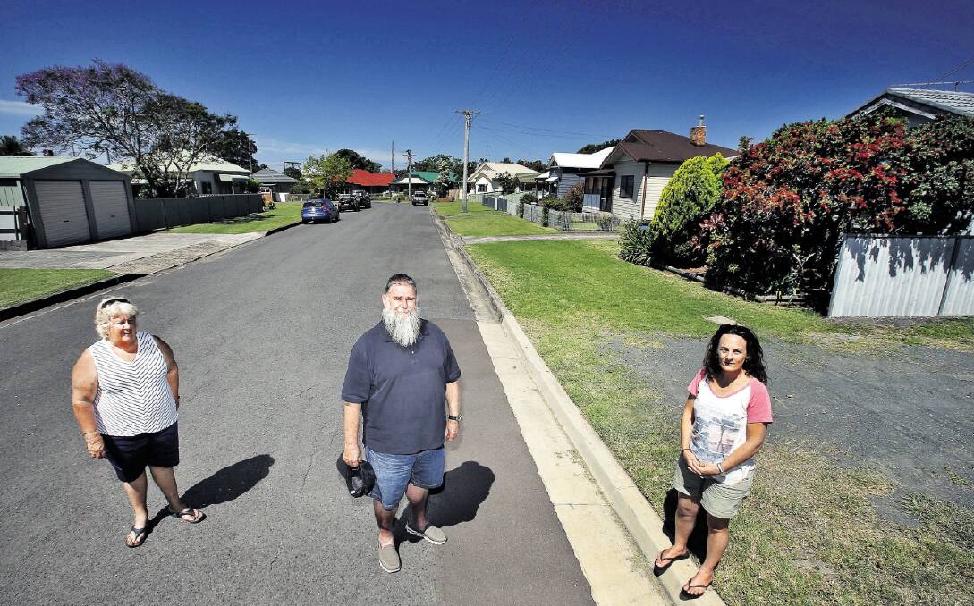 Hewitts Avenue residents Margaret Ryan, Mark Ryan and Raquel Carabine have been waiting  years for flood mitigation works and are affected by  controversial risk modelling. Picture:  KIRK GILMOUR
