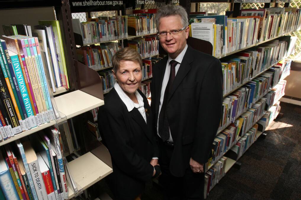 State librarian and chief executive of the State Library of NSW Dr Alex Byrne (right) with Shellharbour City councillor and State Library of NSW executive board delegate Helen Stewart inspecting Warilla Library on Monday. Picture: GREG TOTMAN