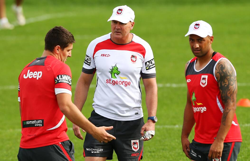 St George Illawarra player Gareth Widdop talks with coach Paul McGregor and Benji Marshall at training. Picture: GETTY IMAGES