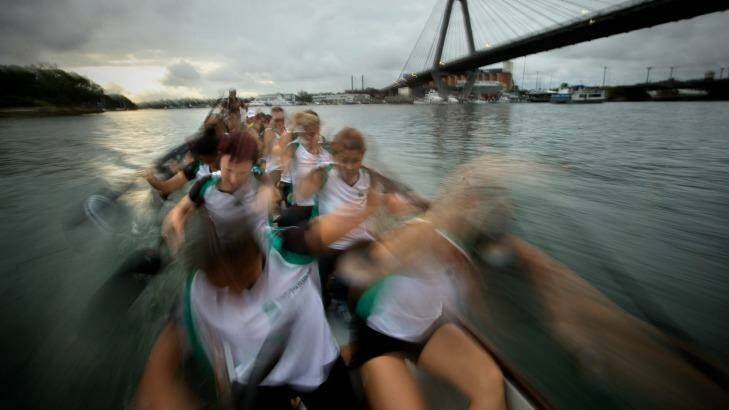 Making waves: Corporate team BNP Paribas during training in their dragon boat at dusk near the Anzac bridge.
20th February 2015
Photo: Wolter Peeters
The Sydney Morning Herald Corporate team BNP Paribas during training in their dragon boat at dusk near the Anzac bridge.

Photo: Wolter Peeters
The Sydney Morning Herald Photo: Wolter Peeters