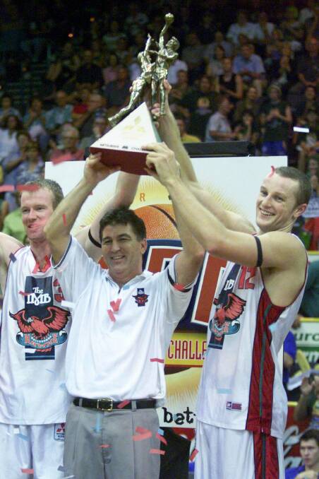 Happier days: Mat Campbell, Brendon Joyce and Glen Saville with the championship trophy after the 2000-01 season.