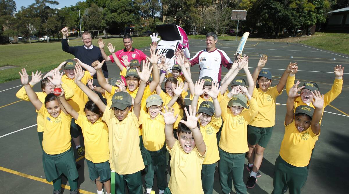 Game on: The Sydney Sixers T20 mascot Syd Sixer was a popular figure at a visit to Coniston Public School to promote the upcoming cricket season. Picture: ANDY ZAKELI