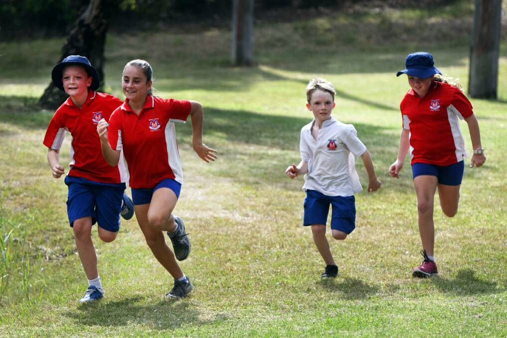 Up to the challenge: Children from Barrack Heights Primary School enjoyed taking part in the School Orienteering Day at Croom Road Sporting Complex last year. The SummerGong Series of orienteering is taking place around the Illawarra over the next month.Picture: SYLVIA LIBER