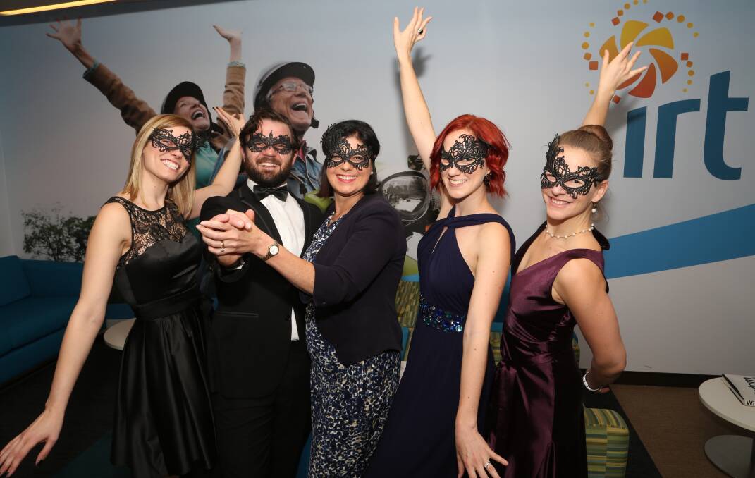 All dressed up: Amelia Parsons, Toby Dawson, Nieves Murray, Ashley Hally-Burton and Natasha Debsieh prepare for the IRT Foundation's Neverland Masquerade Ball. Picture: GREG ELLIS