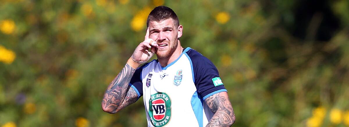 The Dragons' Josh Dugan waits to field a kick during a Blues training session at Coffs Harbour yesterday. Picture: GETTY IMAGES