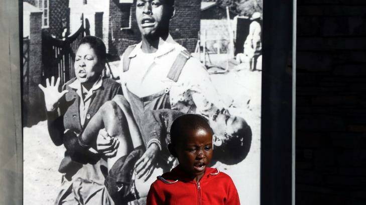 Historic photo at memorial: 13-year-old Hector Pieterson is carried after being shot by police during the 1976 Soweto Uprising. Photo: Themba Hadebe