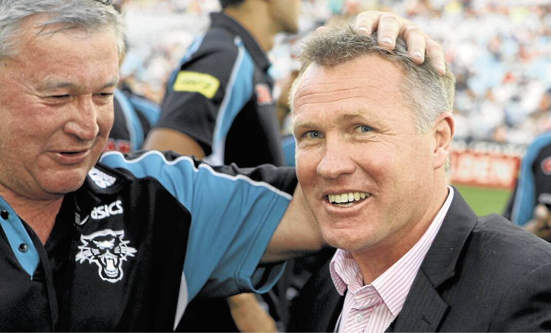 Current Panthers under-20s coach Garth Brennan, right, is favoured to replace the man who punted him from the Knights. Picture: JONATHAN CARROLL