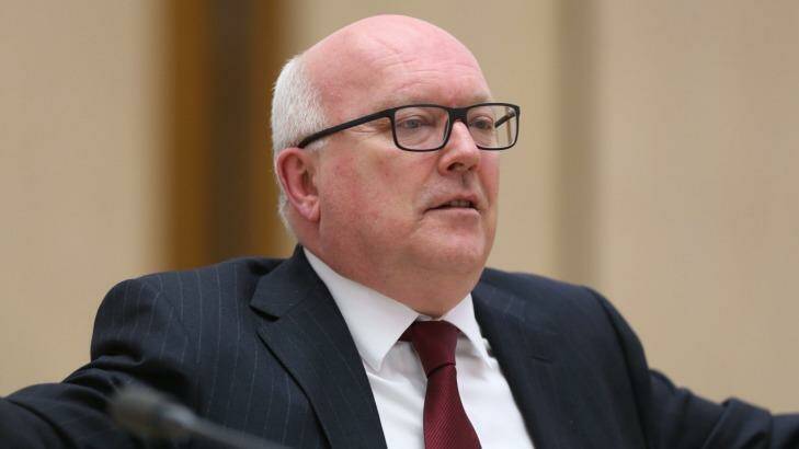 George Brandis said the law reform commission's terms of reference would be subject to consultation with Indigenous communities. Photo: Andrew Meares