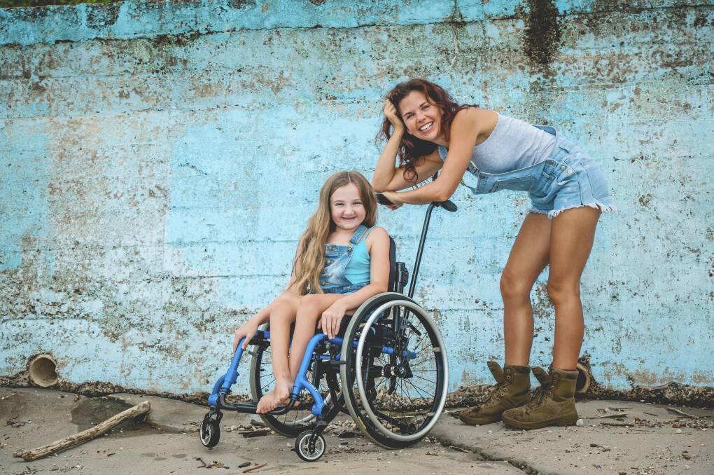 Year 6 student Beth Cooper-Wares, 11, and mother Katie will face the world together as they take on the journey of a lifetime. Beth has limited mobility and is wheelchair reliant. Picture: UNICORN STUDIOS
