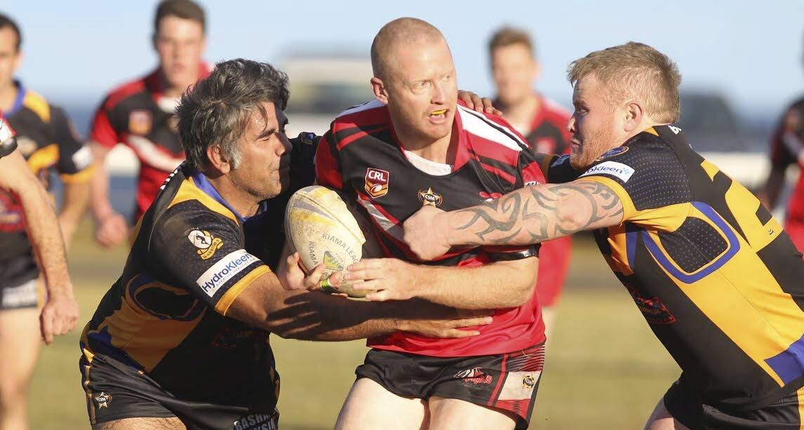 Kiama's replacement hooker Marc Laird looks for support in their match against the Jets. Picture: DAVID HALL