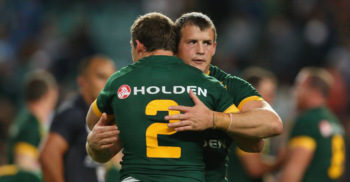 Brett and Josh Morris celebrate victory after the Anzac Test between Australia and New Zealand at Allianz Stadium in Sydney on May 2. Picture: GETTY IMAGES