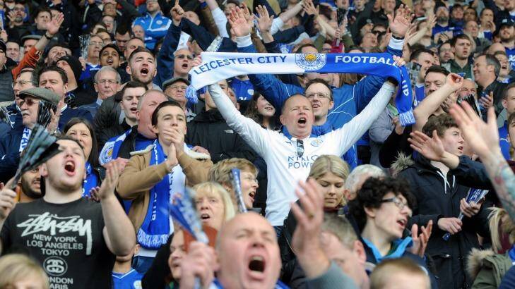 Leicester fans celebrate during the English Premier League soccer match between Leicester City and Southampton at the King Power Stadium in Leicester on April 3, 2016. Photo: Rui Vieira/AP