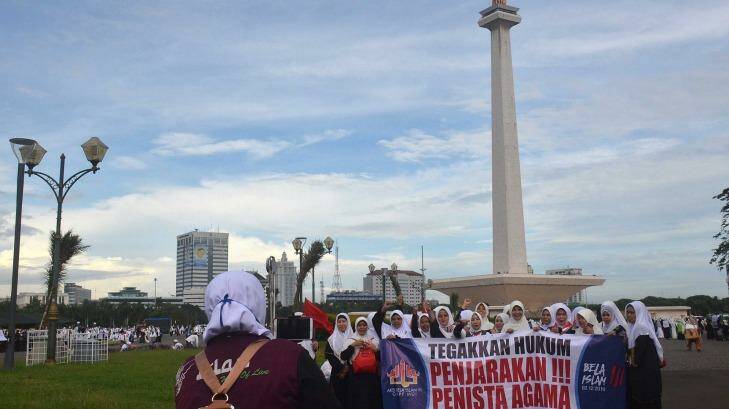 Female protesters against Ahok gather at the national monument in Jakarta. Photo: Dewi Nurcahyani