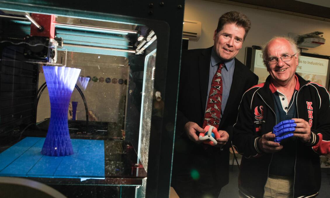 Modfab director Ben Roberts with Kanahooka High School science teacher Ross Tanswell. Modfab has been training teachers to use 3D printers.Picture: CHRISTOPHER CHAN