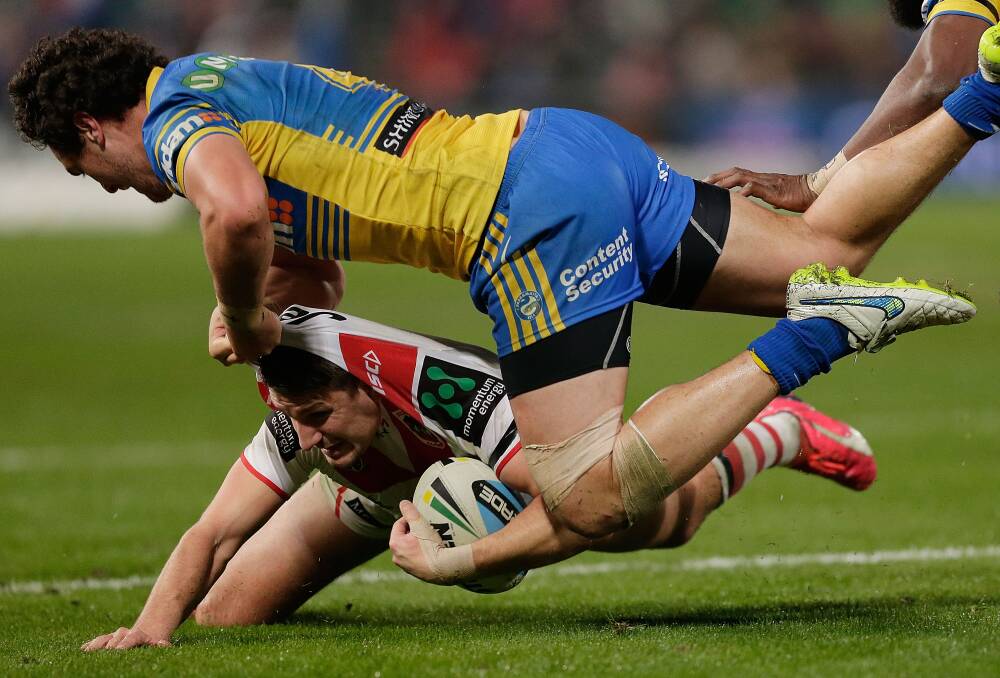 Gareth Widdop, being tackled here, says his side needs to rebuild momentum. Picture: GETTY IMAGES