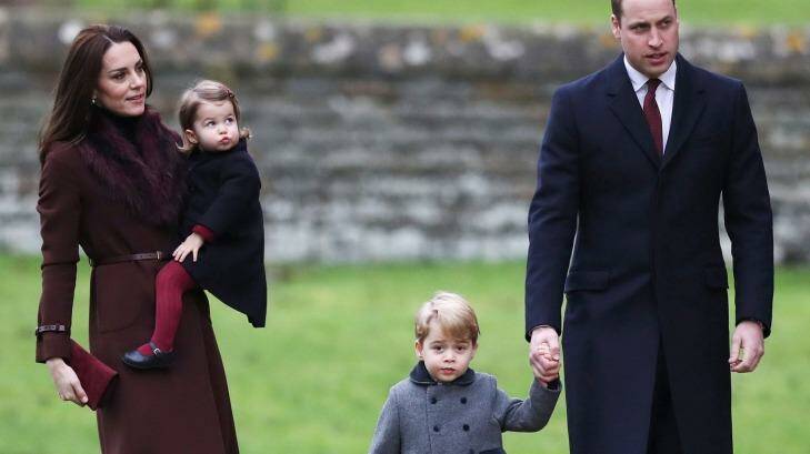 Prince William and Kate arrive at the church with their children Prince George and Princess Charlotte. Photo: Andrew Matthews