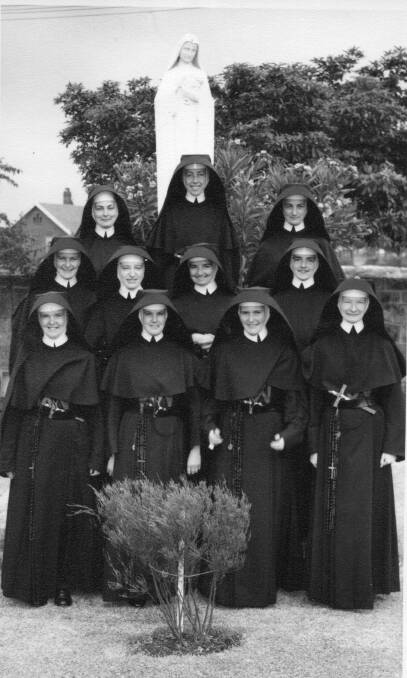  Sister June Bath (middle row, second from left) at St Michael’s Thirroul with a group of nuns.