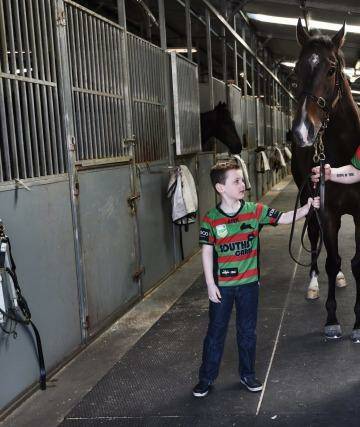 Twin prides: Joe Pride and his son Brave show their colours with Epsom hope Laser Hawk. Photo: Nick Moir