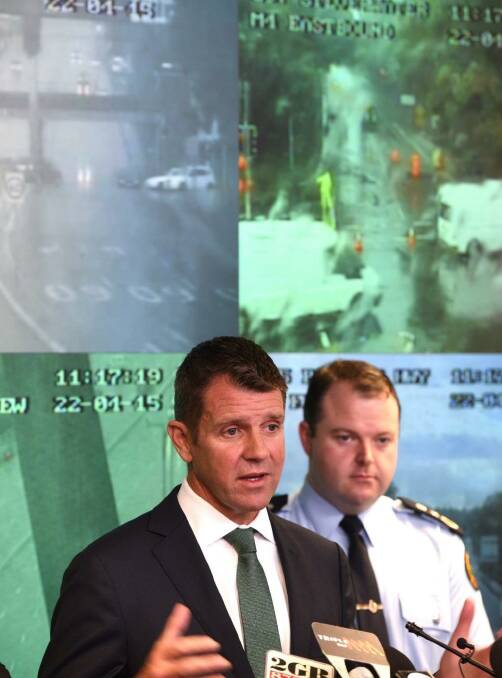 'Unprecedented amount of water': NSW Premier Mike Baird briefs media on the Sydney storm on Wednesday. Photo: Steven Siewert