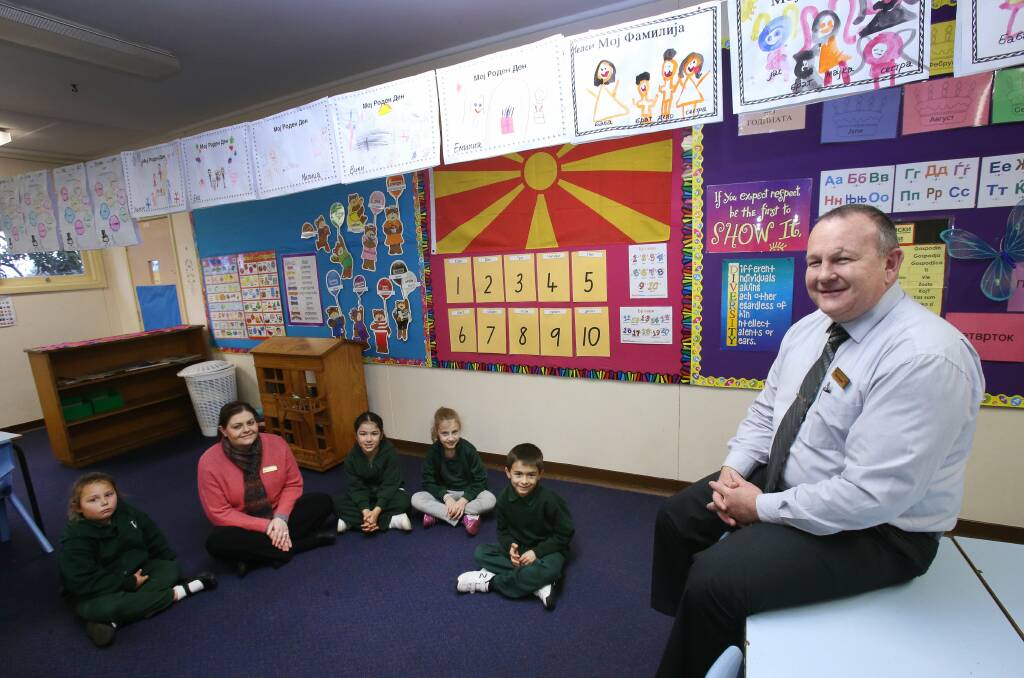 Principal of Warrawong Public School Wayne Farquhar with teacher Diana Kotevski, who currently teaches Macedonian to some students at the school. Picture: KIRK GILMOUR