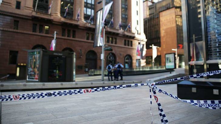 Police have kept tape barricades in Martin Place.  Photo: MARK METCALFE/ GETTY IMAGES