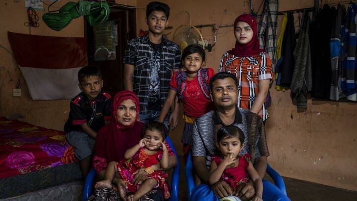 A Rohingya refugee family Muhammad Rofiq, mother Hamidah and their children in a refugee camp in Medan, North Sumatra, Indonesia.  Photo: Ulet Ifansasti
