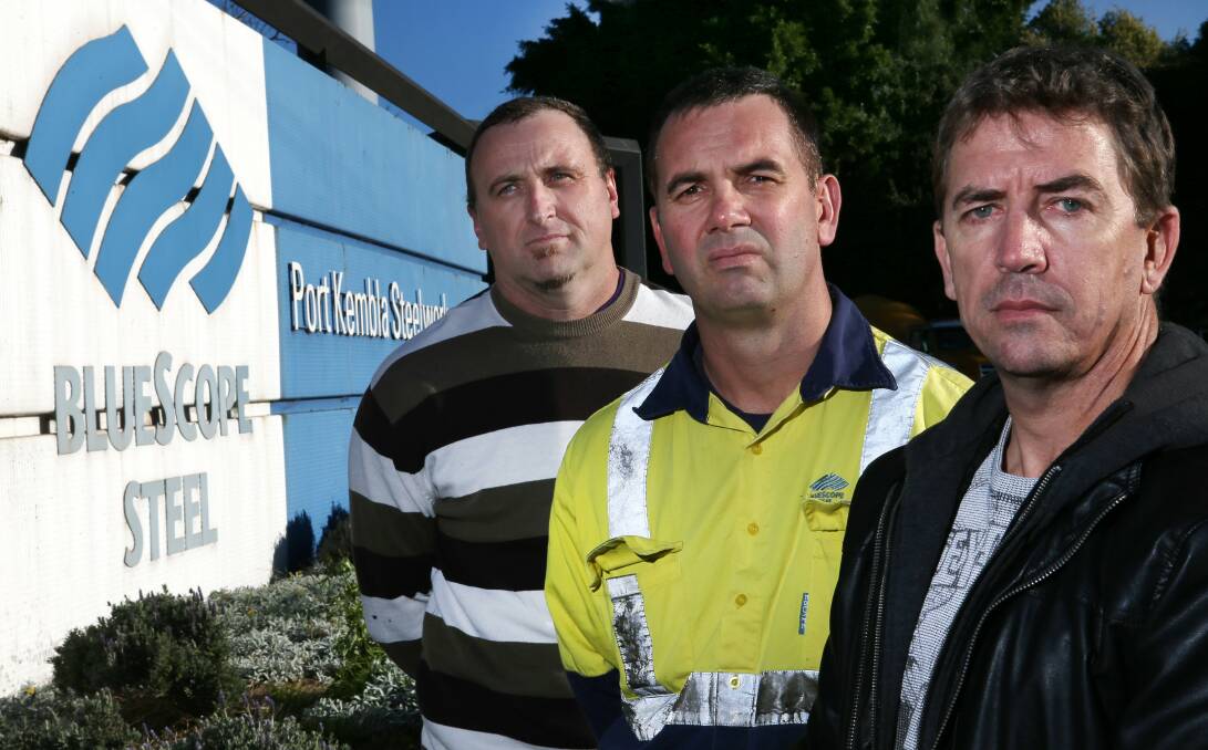 Manny Da Rocha, Glenn Leake and Colin Langlands outside the Port Kembla steelworks, where a number of jobs are on the line. Picture: KIRK GILMOUR