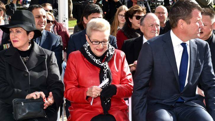  Bronwyn Bishop attending a memorial service to commemorate the Battle of Fromelles with lord mayor Clover Moore (left) and premier Mike Baird in Hyde Park on Sunday.  Photo: Steven Siewert