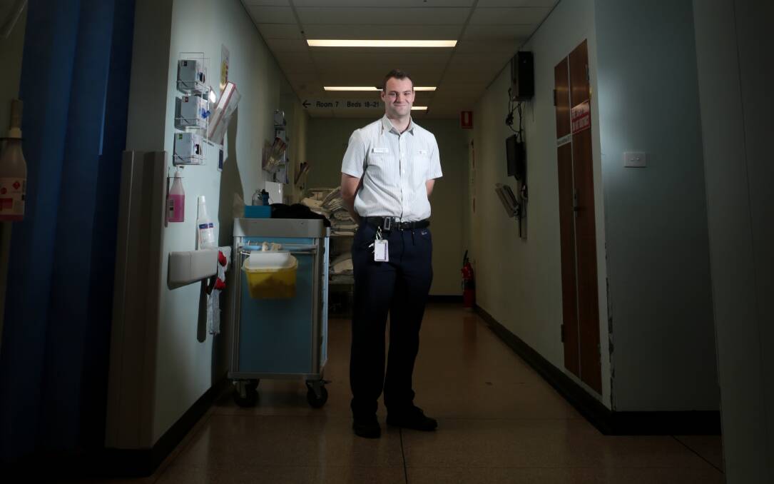 Wollongong Hospital registered nurse Daniel Graham says results of a poll of professions recognises the hard work nurses put into their line of work. Picture: ADAM McLEAN