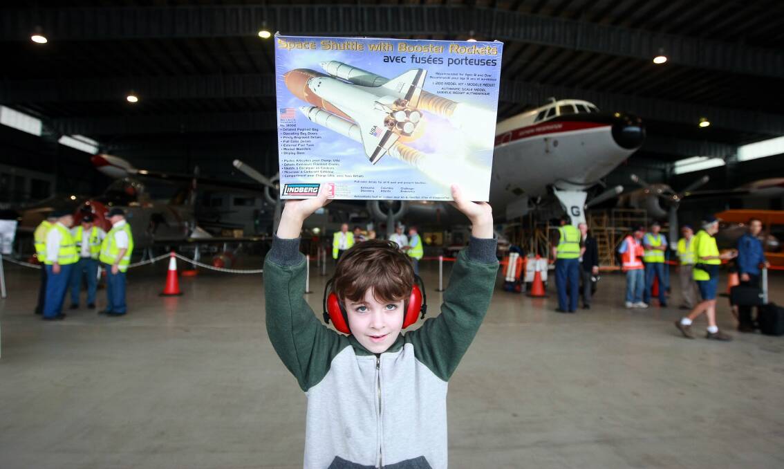 Thrilled: Sydney’s Ezekiel Curnow, 8, is an aviation buff. He made the trip with his grandparents.  Picture: SYLVIA LIBER