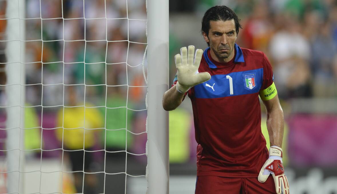 Italian goalkeeper Gianluigi Buffon gestures during the Euro 2012 football championships match Italy vs Republic of Ireland on June 18, 2012 at the Municipal Stadium in Poznan.  Italy won 0-2.   AFP PHOTO Photo by ODD ANDERSEN