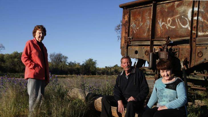 Lorraine Cole, Barry "Fred" Cowie and Peggy Corney visit the site of the Broken Hill picnic train attack where their aunt, Alma Cowie was shot dead in 1915. Photo: Sam Scotting