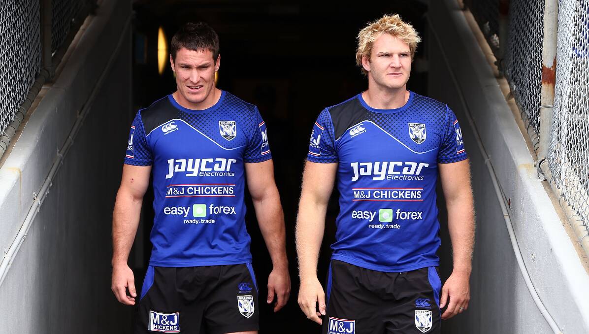  Canterbury Bulldogs Josh Jackson, left, and Aiden Tolman ready for the media scrum at Belmore Sports Ground earlier this week. Picture: GETTY IMAGES