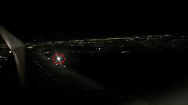 Video footage taken by a passenger shows the plane approaching. Photo: Supplied