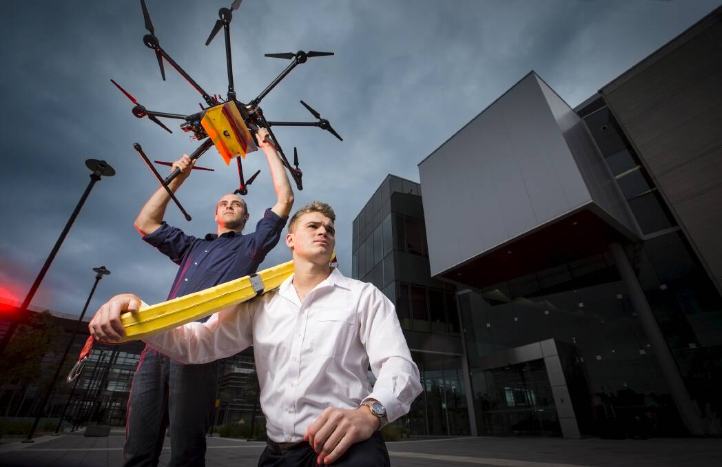 Leo Stevens (front) and Nicholas Roach, who developed the life-saving drone. Picture: PAUL JONES