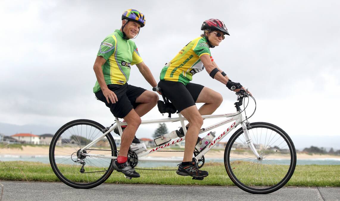 Joint venture: Geoff Stratton pedals while Pamela Dunn keeps her eyes on the road on their tandem bike ride at Barrack Point. Picture: SYLVIA LIBER