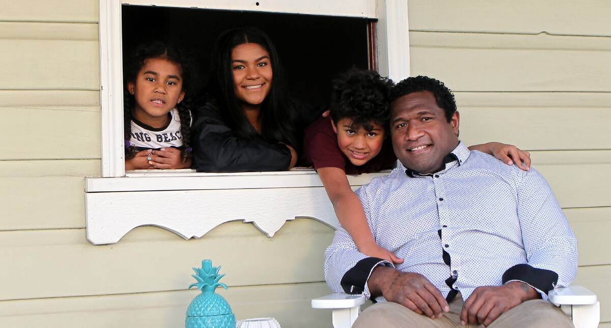 Wollongong dad Ratu "Sugar" Suka with children Zara, Hannah and Malakai. Ratu sees Father's Day as an opportunity to help those who may be doing it tough. Picture: SYLVIA LIBER