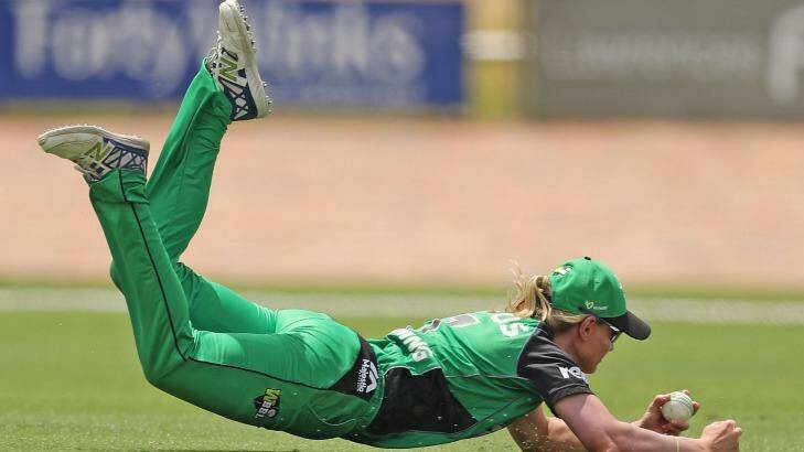 Meg Lanning takes a spectacular diving catch during the WBBL. Photo: Scott Barbour