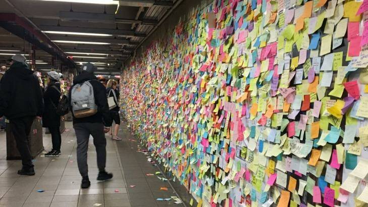 The Union Square murals of sticky notes is ever growing. Photo: Sam Lane