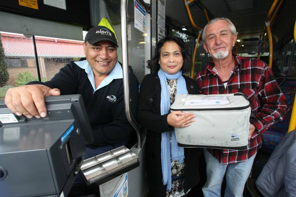 Robert Matagi and Cresaline Ryder deliver meals to Frederick Sweiger. Picture: GREG TOTMAN

