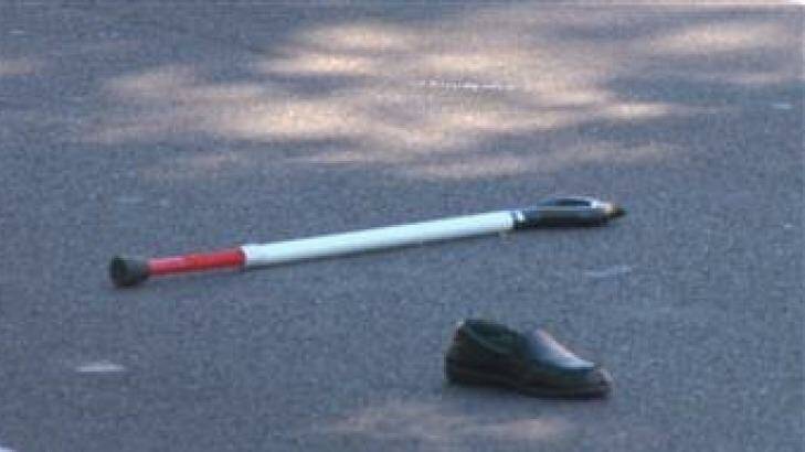 A walking stick and shoe at the scene of the crash. Photo: TNV News