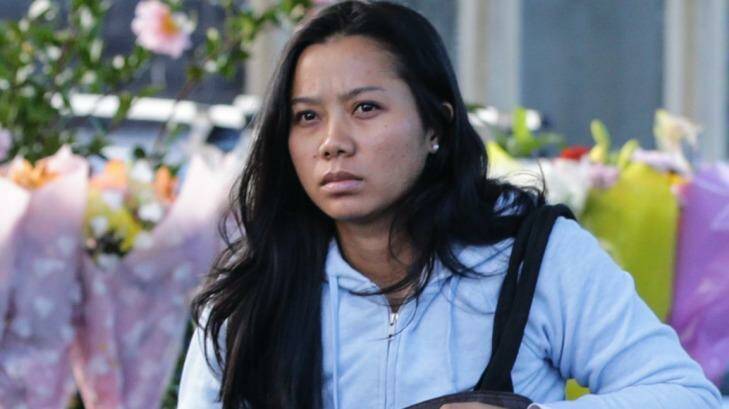 The wife of Andrew Chan, Febyanti Herewila, arrives at the family home. Photo: Dallas Kilponen