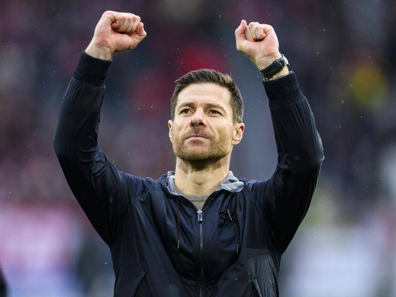 Xabi Alonso has announced he is to remain as head coach of Bayer Leverkusen. (AP PHOTO)