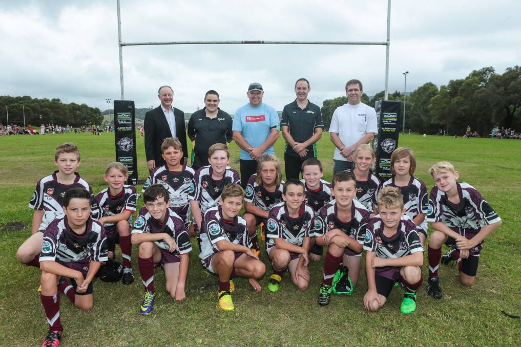 Big day: Sponsors and officials (back, left to right) Dale Whittaker, of MMJ, Michael Tiyce, of Autobarn, Jason Stoker, the Albion Park Oak Flats president, Glen Wonderley, of Autobarn, and Greg Cadorin, from Blooms The Chemist, with the youngsters from Albion Park Oak Flats Junior Rugby League Football Club. Picture: ADAM McLEAN