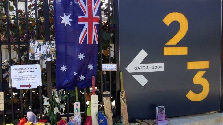 Tributes to Phillip Hughes, placed outside the WACA ground. Photo: Cortlan Bennett