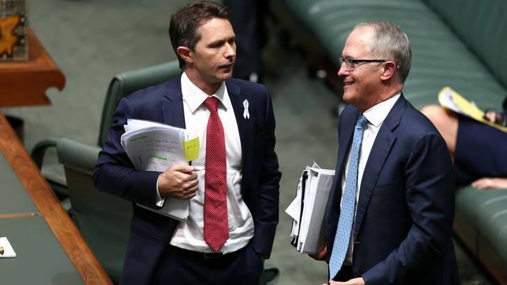 Shadow Communications Minister Jason Clare and Communications Minister Malcolm Turnbull after a division in the House of Representatives on Monday. Photo: Alex Ellinghausen