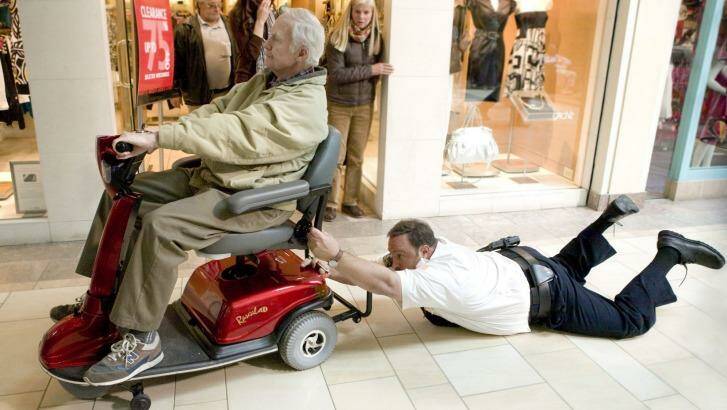 Bernie McInerney as Old Man and Kevin James as Paul Blart in <i>Paul Blart: Mall Cop 2</i>. Photo: Richard Cartwright